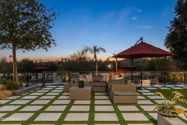 patio terrace at dusk with an outdoor hangout area