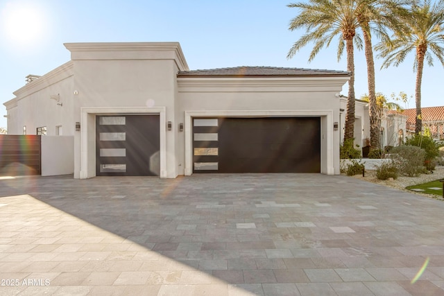 exterior space with decorative driveway