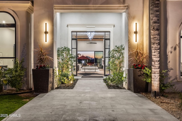 doorway to property with stucco siding