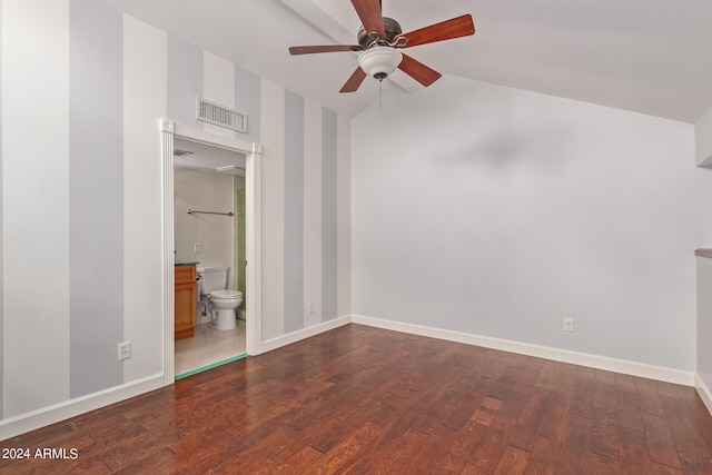 unfurnished bedroom with vaulted ceiling, dark hardwood / wood-style flooring, connected bathroom, and ceiling fan