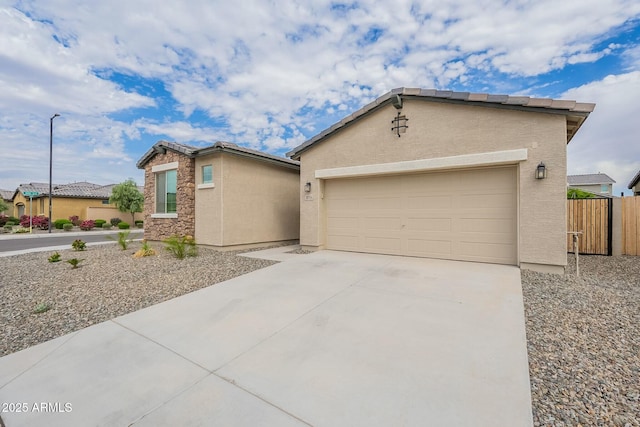 18766 W Montebello Ave, Litchfield Park, AZ 85340 - ranch-style home with driveway, stucco siding, fence, and an attached garage