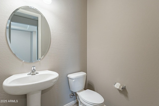 18766 W Montebello Ave, Litchfield Park, AZ 85340 - half bathroom with toilet and a sink