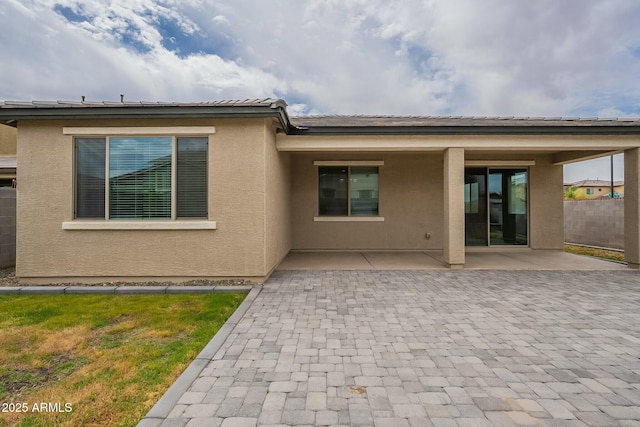 18766 W Montebello Ave, Litchfield Park, AZ 85340 - rear view of house featuring a patio area and stucco siding