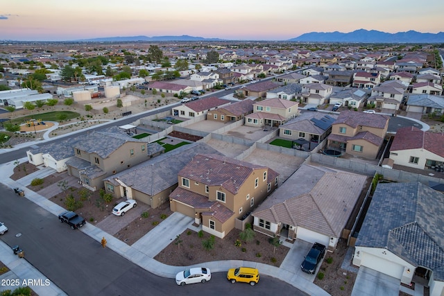 aerial perspective of suburban area with a mountain backdrop
