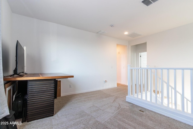 unfurnished living room featuring carpet flooring, baseboards, recessed lighting, and plenty of natural light