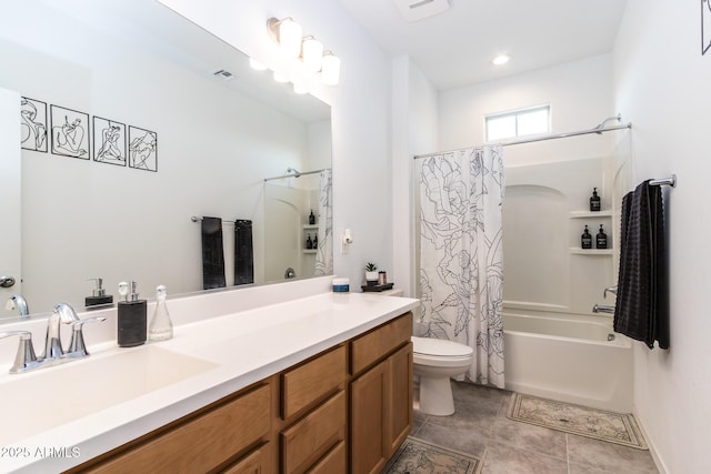 bathroom with toilet, shower / tub combo with curtain, tile patterned flooring, and vanity