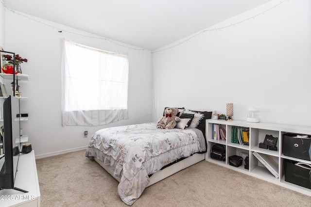 bedroom featuring carpet flooring and lofted ceiling