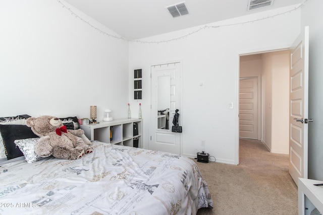 bedroom with carpet floors and baseboards