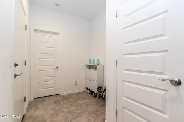 mudroom featuring baseboards