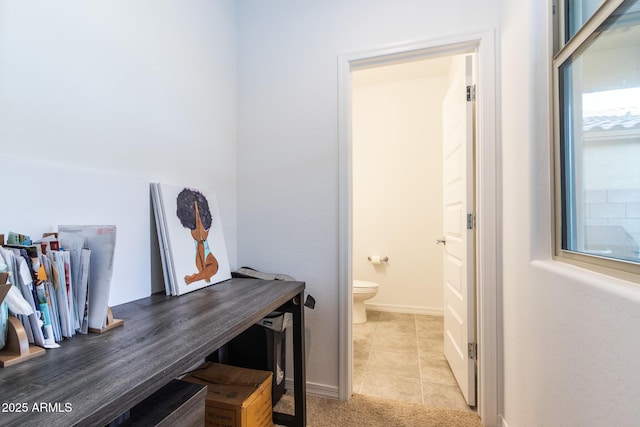 tiled home office with baseboards