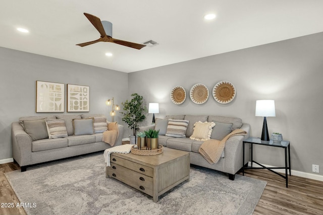4840 E Sunnyside Dr, Scottsdale, AZ 85254 - living area with baseboards, a ceiling fan, visible vents, and light wood-style floors