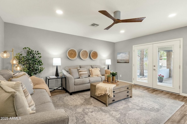 4840 E Sunnyside Dr, Scottsdale, AZ 85254 - living area featuring a ceiling fan, wood finished floors, french doors, baseboards, and visible vents