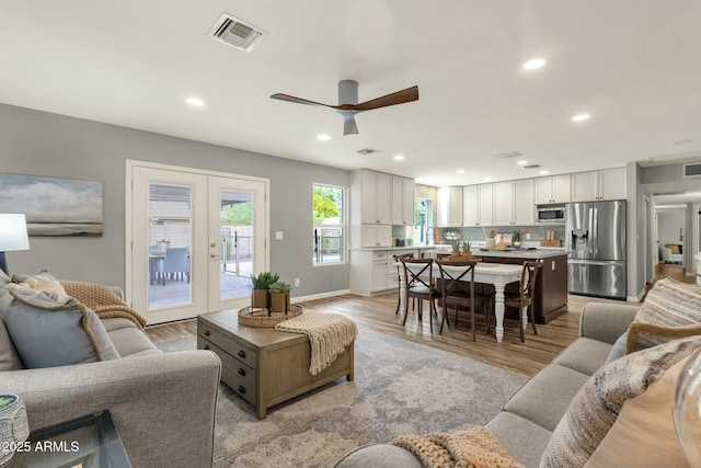 4840 E Sunnyside Dr, Scottsdale, AZ 85254 - living room featuring a ceiling fan, visible vents, recessed lighting, and light wood-style floors