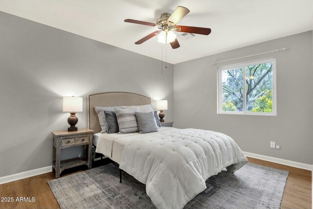 4840 E Sunnyside Dr, Scottsdale, AZ 85254 - bedroom with visible vents, baseboards, wood finished floors, and ceiling fan