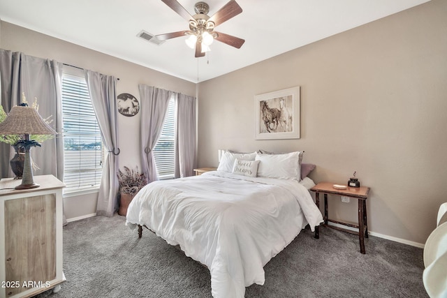 bedroom with carpet, visible vents, ceiling fan, and baseboards