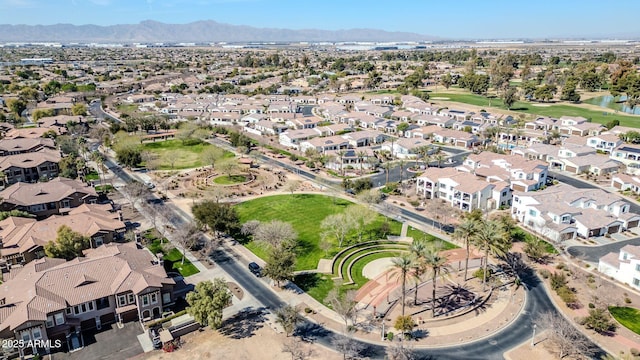 birds eye view of property with a residential view, a mountain view, and golf course view