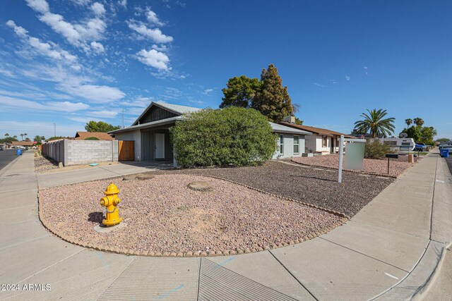 exterior space with a carport