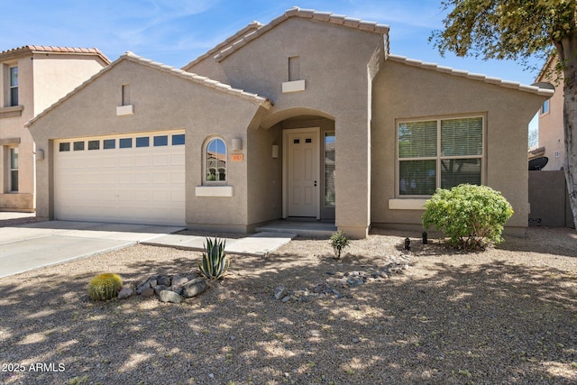 3013 W Via De Pedro Miguel, Phoenix, AZ 85086 - view of front facade featuring an attached garage, stucco siding, a tile roof, and concrete driveway
