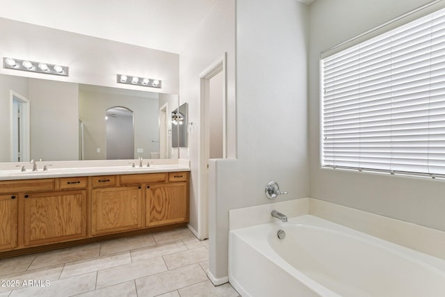 3013 W Via De Pedro Miguel, Phoenix, AZ 85086 - full bath featuring double vanity, a garden tub, and tile patterned floors