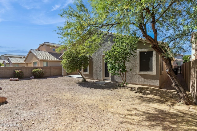 3013 W Via De Pedro Miguel, Phoenix, AZ 85086 - view of front facade with stucco siding and a fenced backyard
