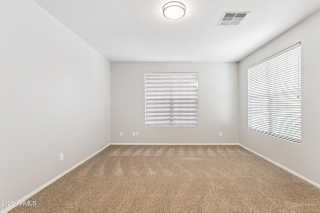 3013 W Via De Pedro Miguel, Phoenix, AZ 85086 - spare room with light colored carpet and baseboards