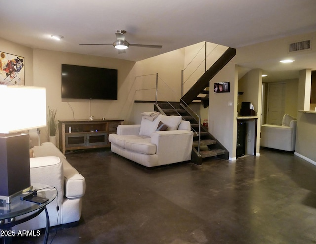 living room featuring ceiling fan