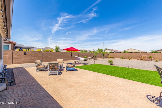 view of patio with a fenced backyard