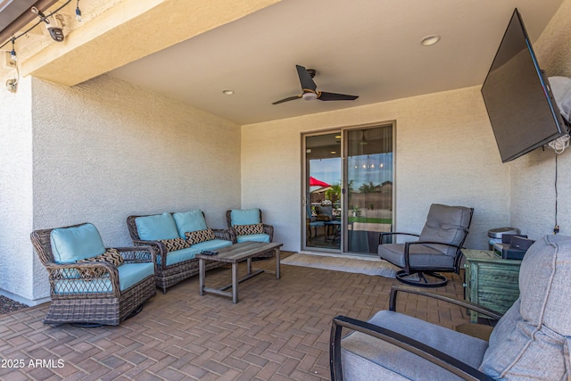 view of patio / terrace featuring an outdoor living space and a ceiling fan