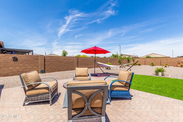 view of patio featuring a fenced backyard