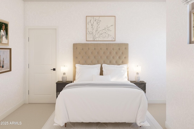 carpeted bedroom featuring baseboards