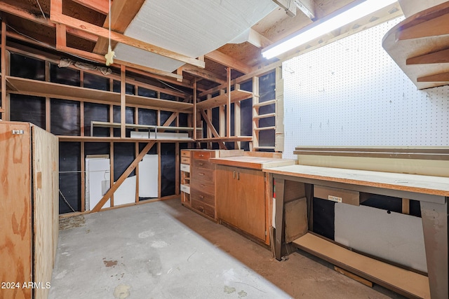 basement with a workshop area