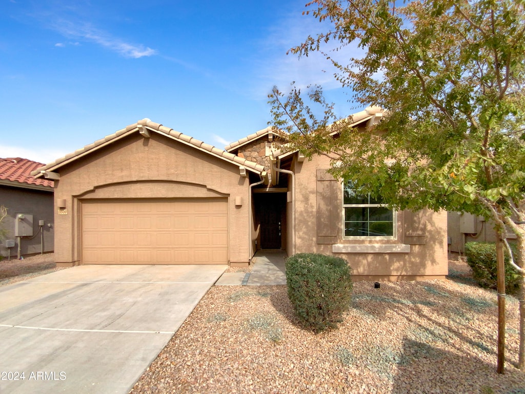 view of front of property featuring a garage