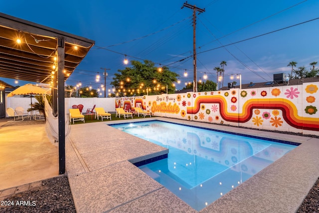 view of pool featuring a patio