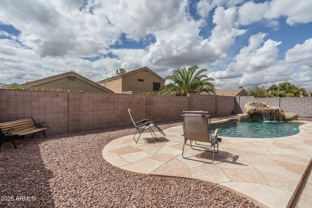 view of pool featuring a patio area, a fenced in pool, and a fenced backyard