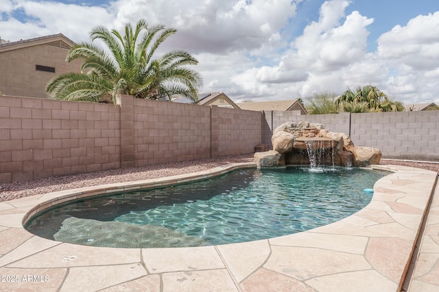 view of pool with a fenced backyard and a fenced in pool