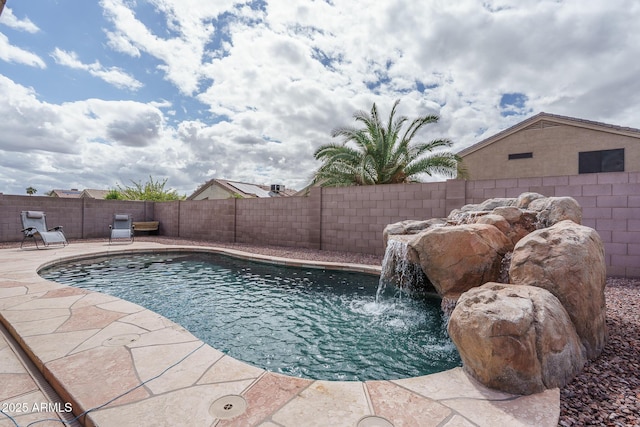 view of swimming pool with a fenced in pool, a patio, and a fenced backyard