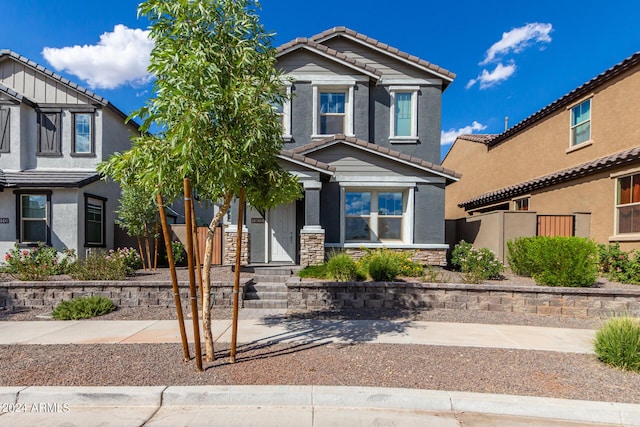 1906 W Lariat Ln, Phoenix, AZ 85085 - view of front of property featuring stone siding, a tiled roof, and stucco siding