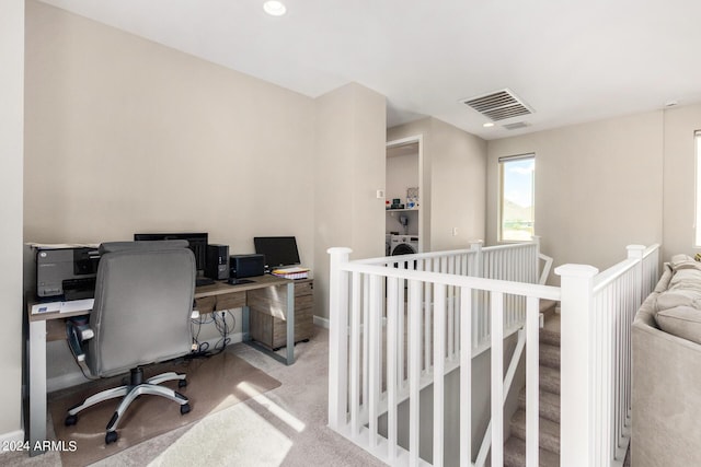 1906 W Lariat Ln, Phoenix, AZ 85085 - carpeted office space featuring baseboards, visible vents, and washer / clothes dryer