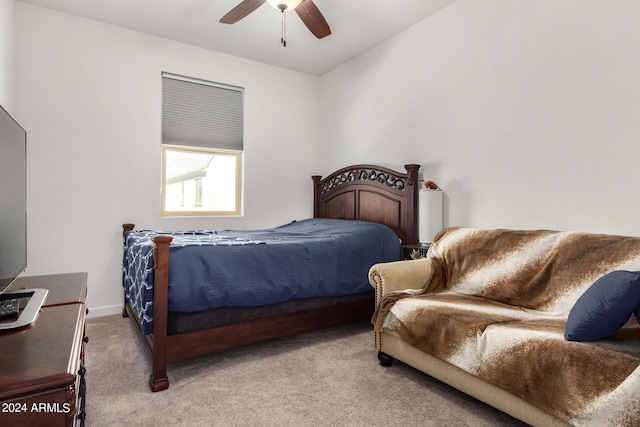 1906 W Lariat Ln, Phoenix, AZ 85085 - bedroom with light colored carpet, ceiling fan, and baseboards