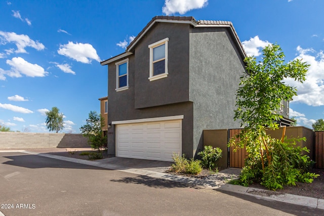 view of home's exterior with a garage