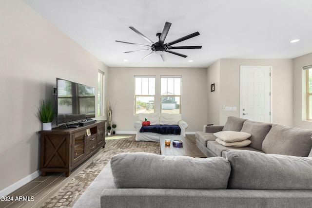 1906 W Lariat Ln, Phoenix, AZ 85085 - living area featuring wood finished floors, recessed lighting, baseboards, and ceiling fan