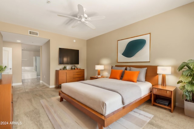 bedroom with baseboards, visible vents, a ceiling fan, and light colored carpet