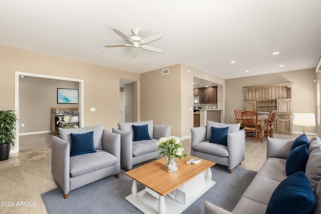 living area with baseboards, visible vents, a ceiling fan, and recessed lighting