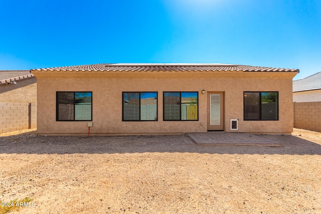 rear view of house with a patio area