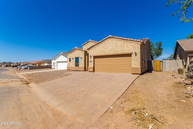 view of front of home with a garage