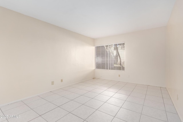 view of tiled spare room