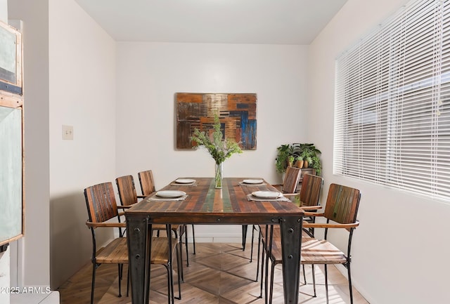 dining room with parquet floors