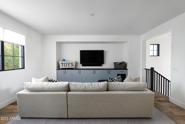 living room with hardwood / wood-style flooring and plenty of natural light