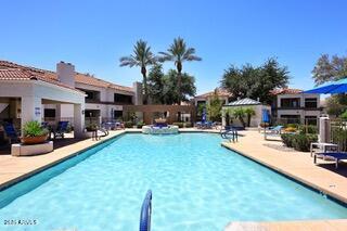 11375 E Sahuaro Dr Unit 2064, Scottsdale, AZ 85259 - community pool with a patio area