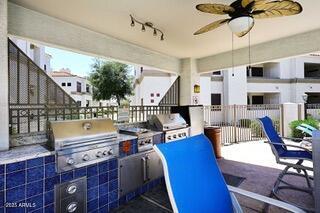 11375 E Sahuaro Dr Unit 2064, Scottsdale, AZ 85259 - view of patio / terrace with an outdoor kitchen and ceiling fan